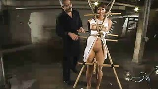 Bamboo BDSM play with bound Asian slut and her master