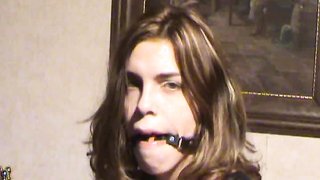 Chained-up teen looks terrified as she faces her captor