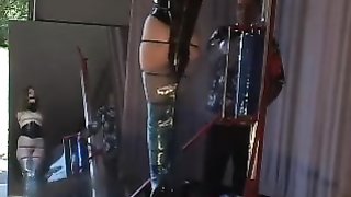 Good naked doll in black corset is enjoying hardcore bondage