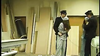 Two arrested chicks are getting painfully spanked in the jail