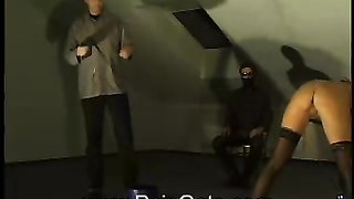 Brutal and painful spanking action with a slender doll