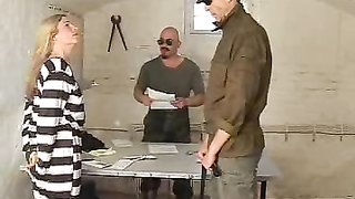 Alluring submissive blonde gets treated by two prison guards