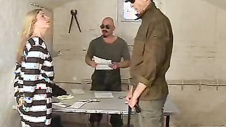 Arrested blonde gets her ass lashed by two prison guards