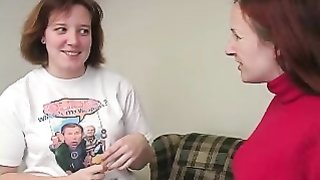 Awesome redhead chick spanks her submissive doll on the couch