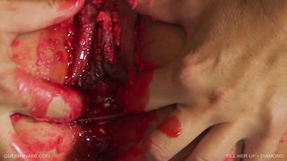 Skinny young Domina treats her big-boobed MILF doll with wax