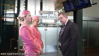 Beautiful babes in pink uniform are both enjoying spanking