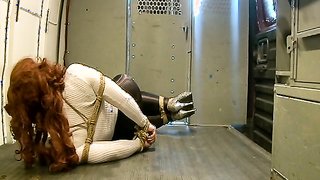 Astonishing redhead hottie in high heels and hogtie bondage