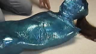 Gorgeous mummification with polyethylene and chains