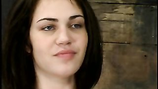 Cute-looking busty babe has a very nice round bottom for spanking