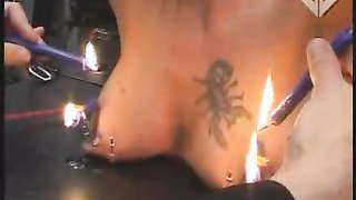 Sexy busty redhead is definitely enjoying hardcore torturing