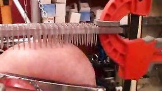 Big-ass chick gets her boobs penetrated with nails