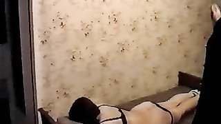 Perfect brunette in black lingerie enjoys domination and pain