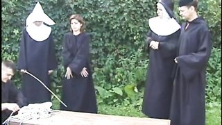 Passionate brunette with big bottom gets hardly spanked by nuns