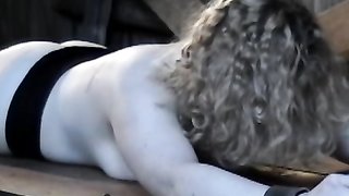 Curly-haired hottie BBW hardly caned on the cold table