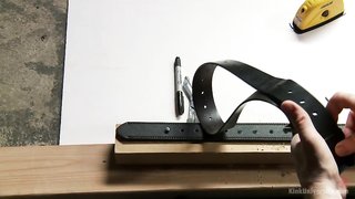 Nikki Darling bound with belts by her master