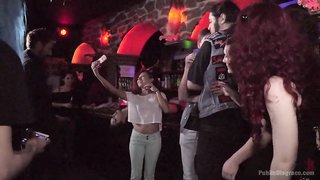 Slut on her knees gets a deep throat action in the club
