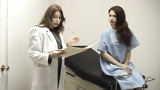 Gagged babe looks helpless in straitjacket