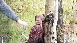 Taped to tree and flogged