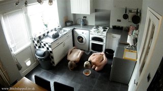 Two sub babes in handcuffs are both drinking from bowls