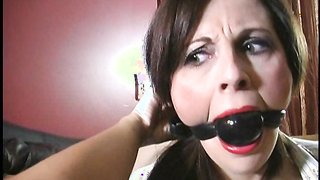 Gagged young chick with red lips enjoys hardcore bondage