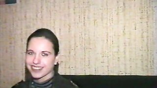 Brunette with perfect body is lying on the table during spanking