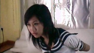 Perfect Asian brunette in handcuffs feels real pain