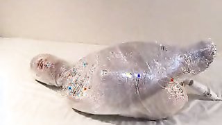 Nasty master bounds his Asian doll with layers of polyethylene