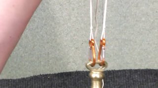 Clamped  weights on the pussy lips of this blonde, must be painful