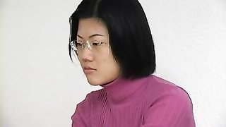 Nerdy Asian pet trained at work with ass spanking