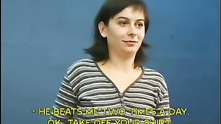 Submissive brunette shows off her naked bottom on the casting