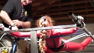 Lovely redhead with a  long thick braid is bound by and old master