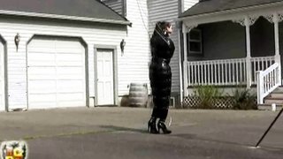 Gagged and bound in latex bag suit MILF suffers