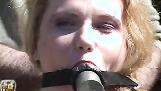 Master humiliates and treats a big-boobed babe in corset