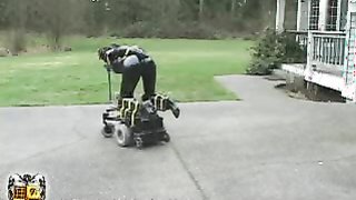 Sub babe in black latex suit sucks a black toy in crazy machine