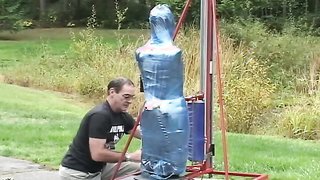 Fully wrapped in polyethylene babe left under the sun