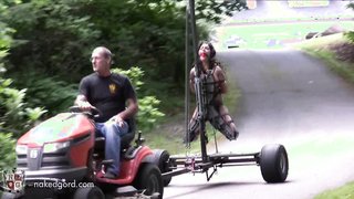 Enslaved babe bound and dildo fucked on the move